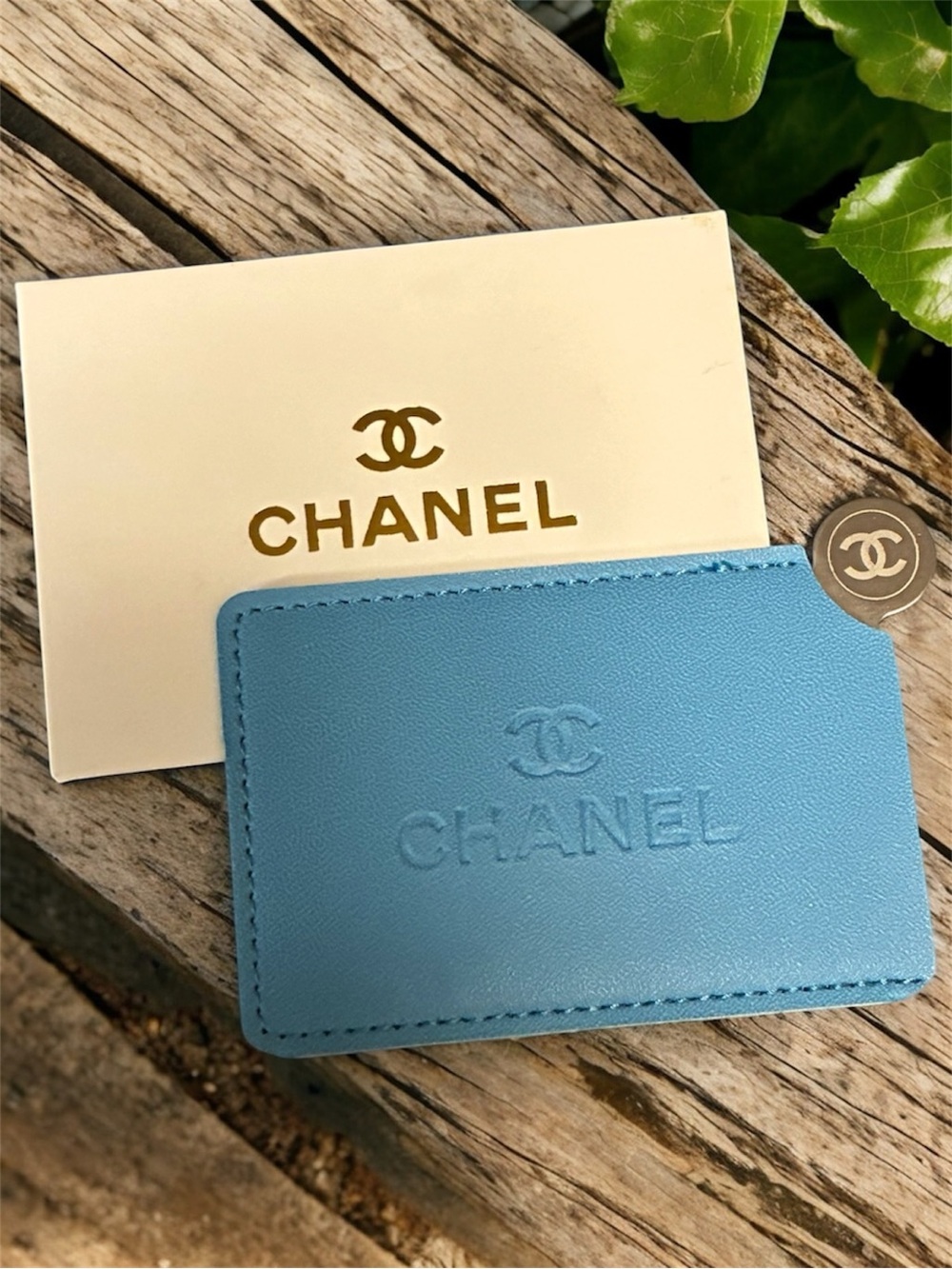CHANEL Sky Blue Embossed Leather Card
Sleeve/Mirror